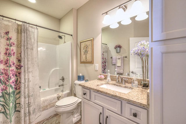 full bathroom featuring toilet, vanity, and shower / tub combo with curtain