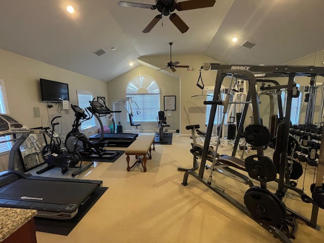 gym with ceiling fan and vaulted ceiling