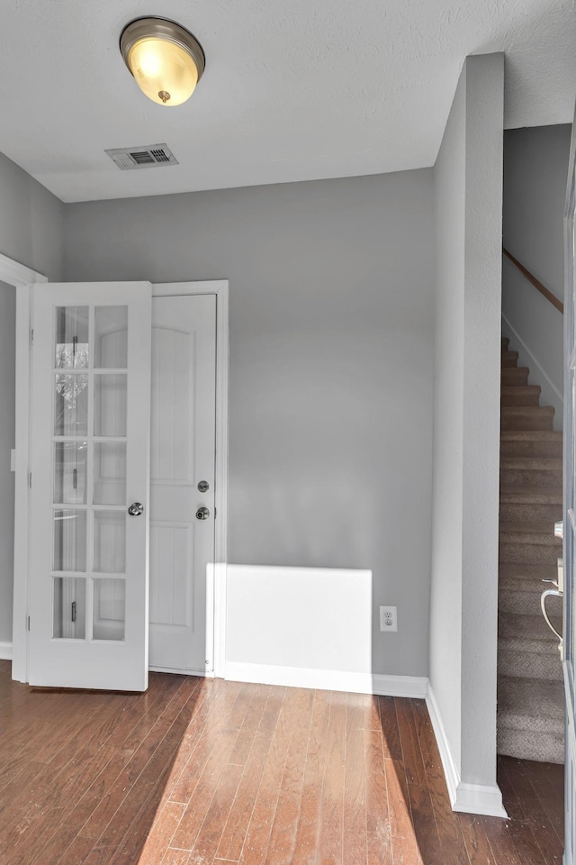 interior space featuring dark hardwood / wood-style flooring