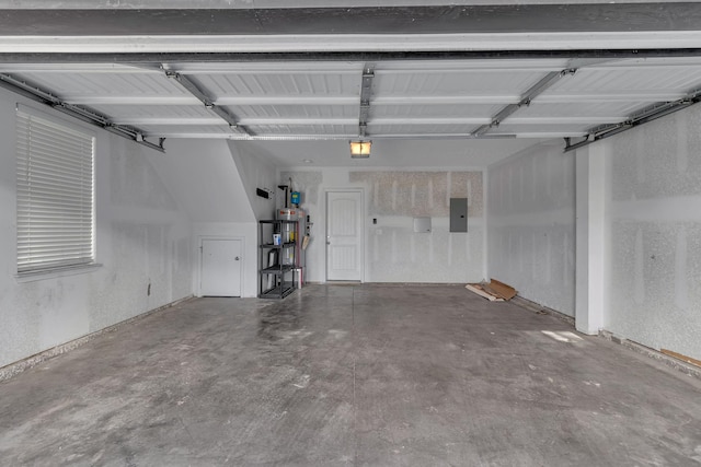 garage featuring electric water heater, a garage door opener, and electric panel