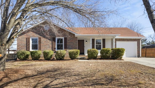 single story home featuring a garage