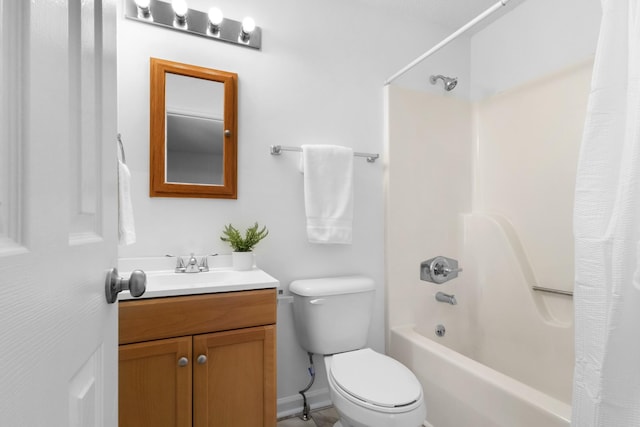 full bathroom with toilet, vanity, and shower / tub combo