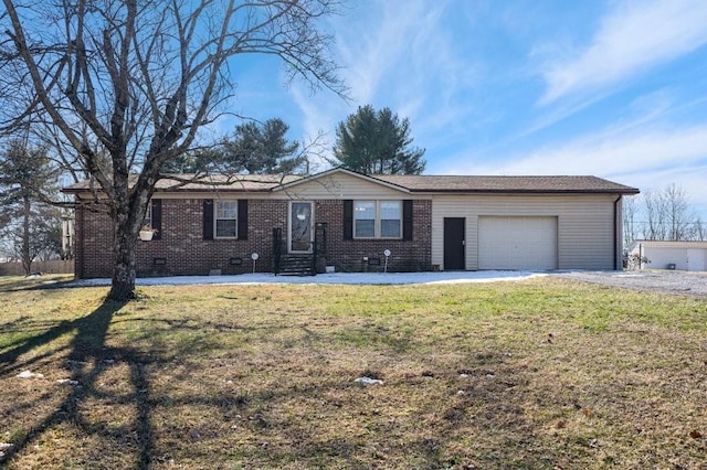 ranch-style house with a garage and a front lawn