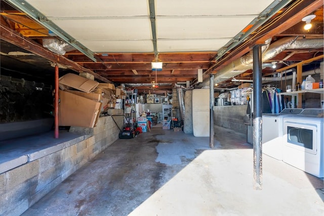 basement with washing machine and dryer