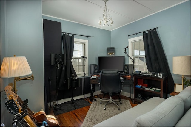 office space with hardwood / wood-style floors and a notable chandelier