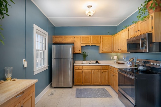 kitchen featuring sink and appliances with stainless steel finishes