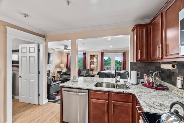 kitchen featuring backsplash, stainless steel dishwasher, electric range, sink, and french doors