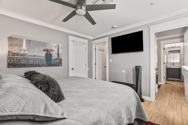 bedroom with ceiling fan, ensuite bathroom, ornamental molding, and light hardwood / wood-style flooring