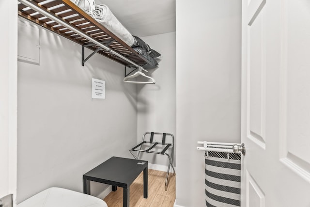 spacious closet featuring light hardwood / wood-style floors