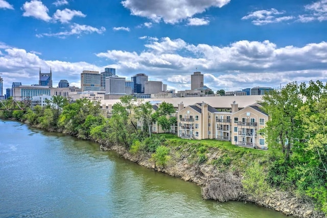 birds eye view of property featuring a water view