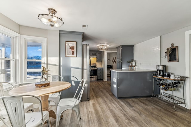 dining room featuring hardwood / wood-style flooring