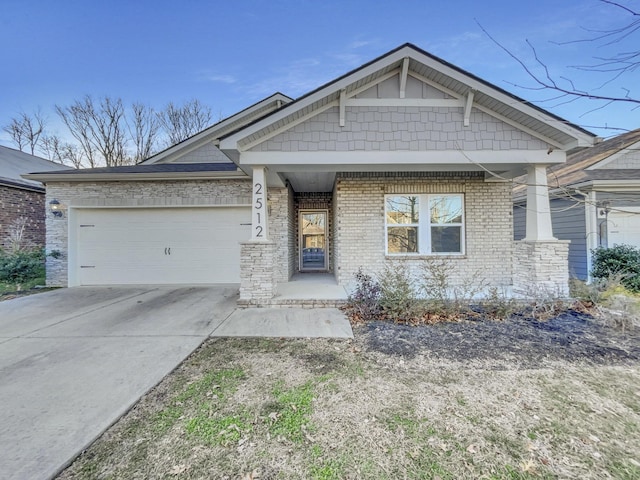 craftsman-style house with a porch and a garage