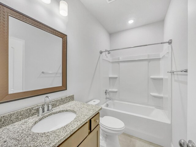 full bathroom with toilet, vanity, and shower / bathing tub combination