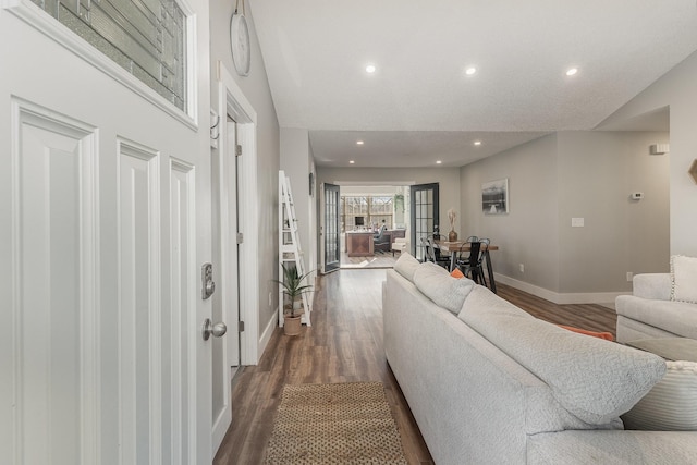 living room featuring dark hardwood / wood-style floors