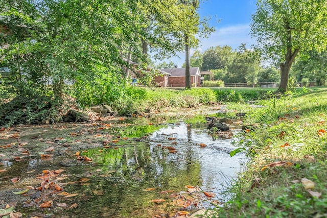 view of yard with a water view