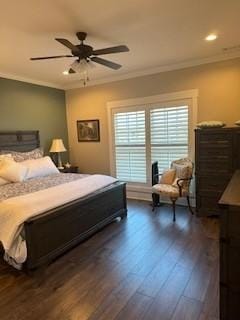 bedroom with ceiling fan, dark hardwood / wood-style flooring, and crown molding