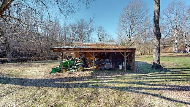 view of outdoor structure with a lawn