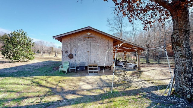 exterior space with a storage shed