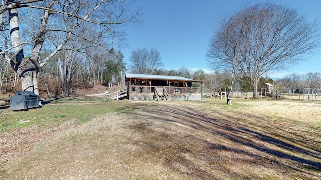 exterior space featuring a wooden deck