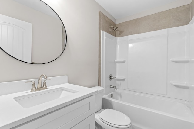 full bathroom featuring toilet, vanity, and shower / washtub combination