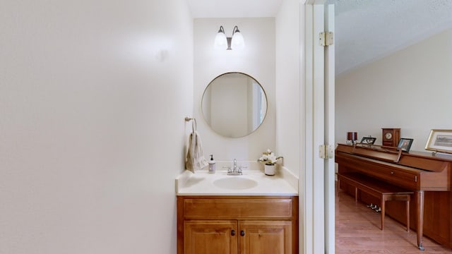 bathroom featuring vanity and hardwood / wood-style floors