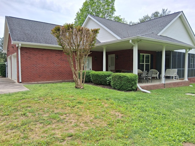 1253 White Rd, Bon Aqua, TN 37025 - view of front of home featuring an attached garage, brick siding, a shingled roof, and a front yard