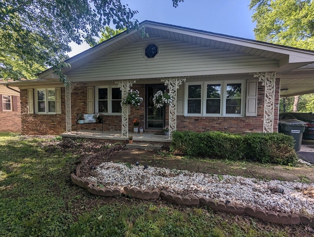 view of front of property featuring covered porch