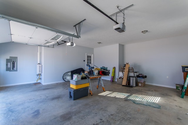 garage featuring electric panel, gas water heater, and a garage door opener