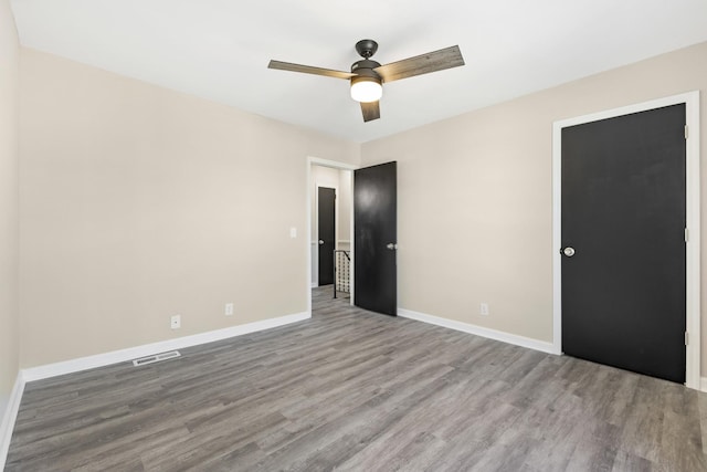 unfurnished room with light hardwood / wood-style floors and ceiling fan