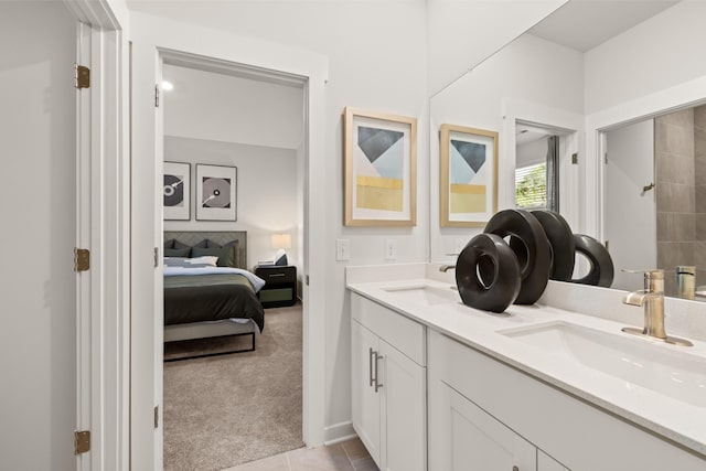 bathroom featuring vanity and tile patterned flooring