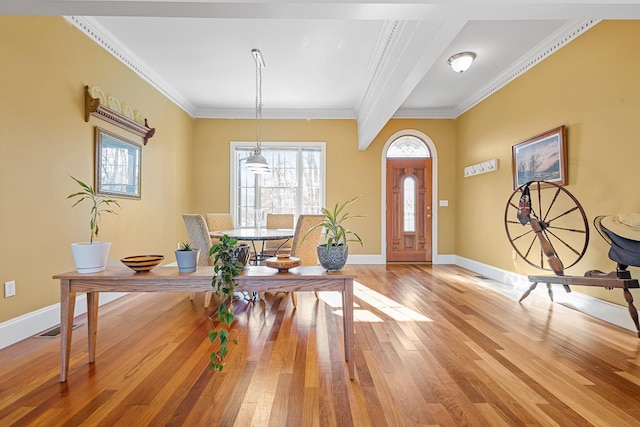 foyer featuring light hardwood / wood-style flooring and ornamental molding