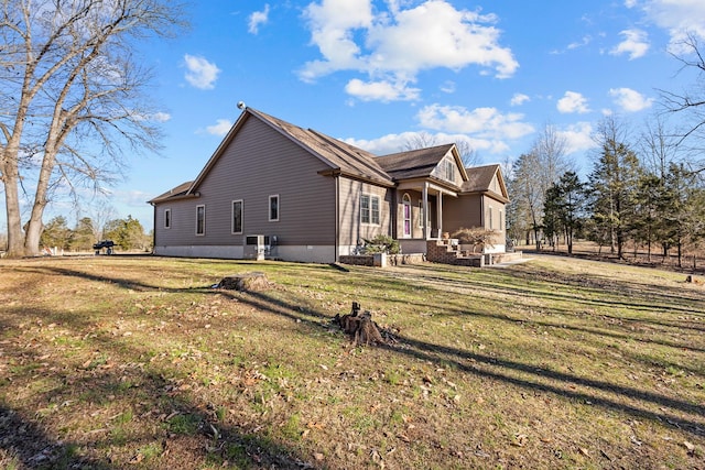 view of property exterior featuring a lawn