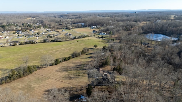 drone / aerial view featuring a rural view and a water view