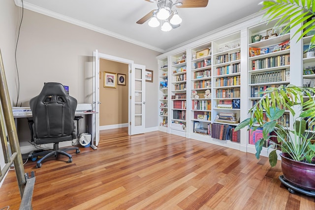 office space with ceiling fan, french doors, crown molding, and hardwood / wood-style floors