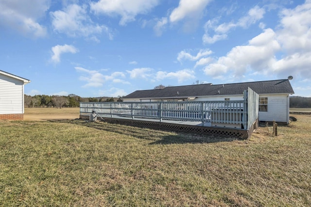 view of yard with a wooden deck