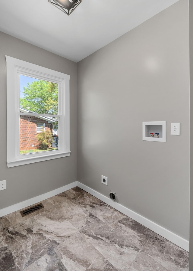 washroom with hookup for a washing machine and electric dryer hookup