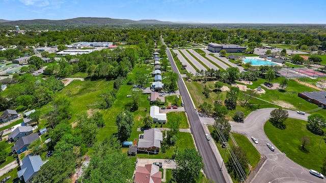 birds eye view of property featuring a mountain view