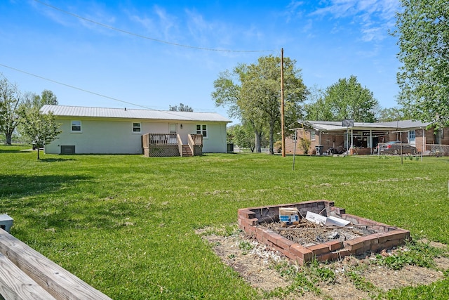 view of yard with a wooden deck