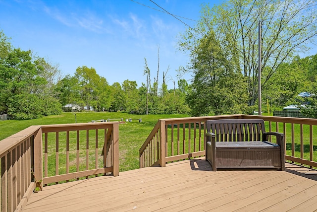 wooden deck with a yard