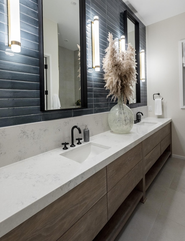 bathroom with vanity and tile patterned floors