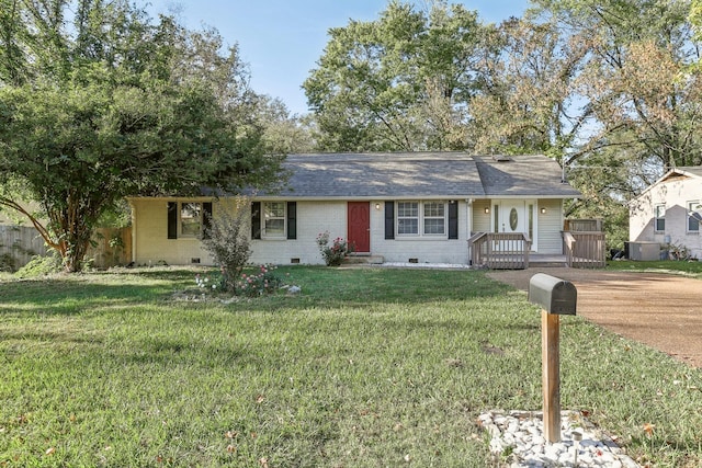 ranch-style house with a front yard