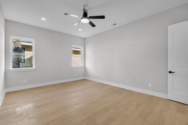 unfurnished room with visible vents, baseboards, ceiling fan, light wood-style floors, and recessed lighting