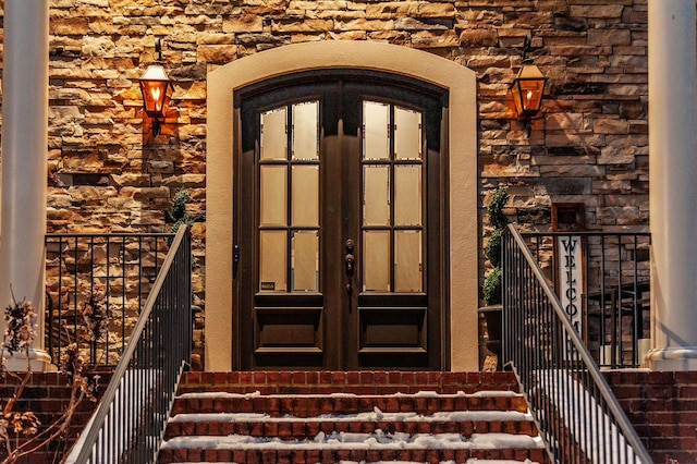 property entrance featuring french doors