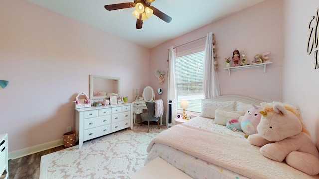 bedroom featuring ceiling fan and wood-type flooring