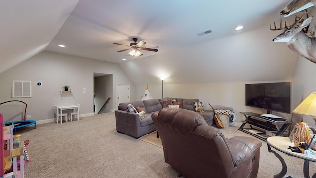 carpeted living room with vaulted ceiling and ceiling fan