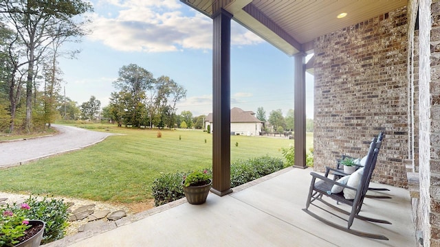 view of patio featuring a porch