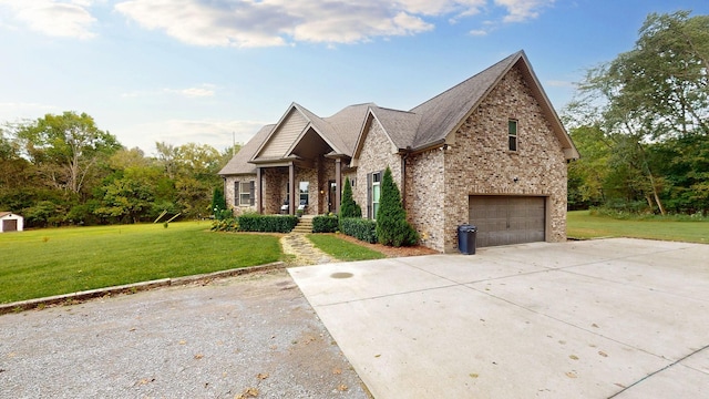 view of front of house with a front yard and a garage