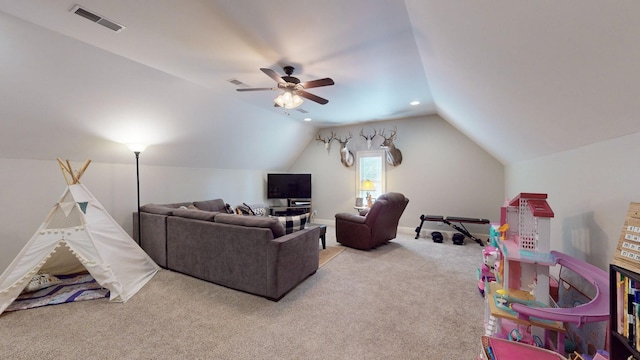 living room with ceiling fan, light carpet, and vaulted ceiling