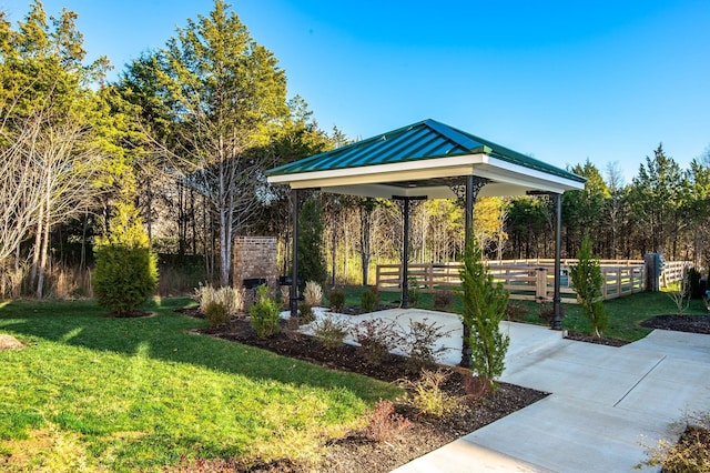 view of community featuring a gazebo and a yard