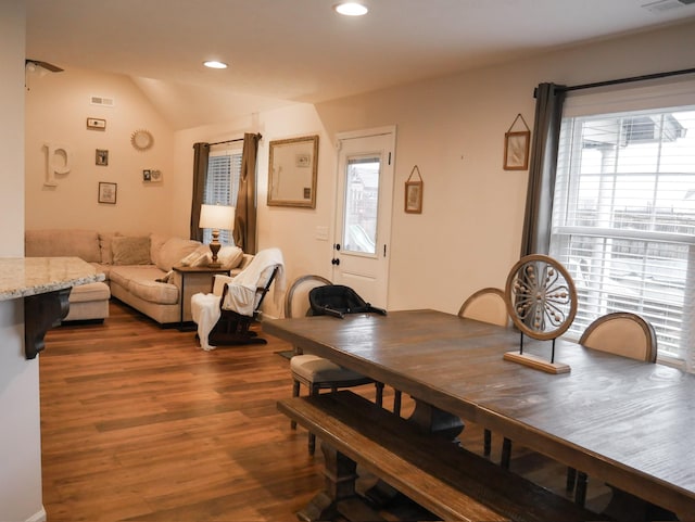 dining space featuring dark hardwood / wood-style floors